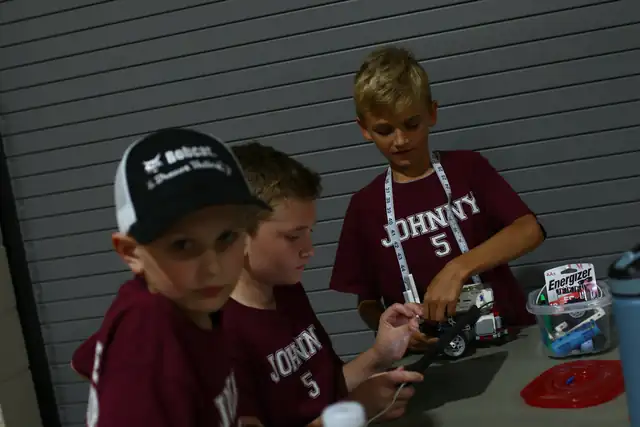 A team readies its robot at a competition